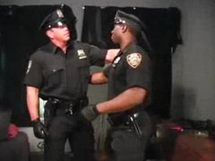 Two hunk cops smoking each other